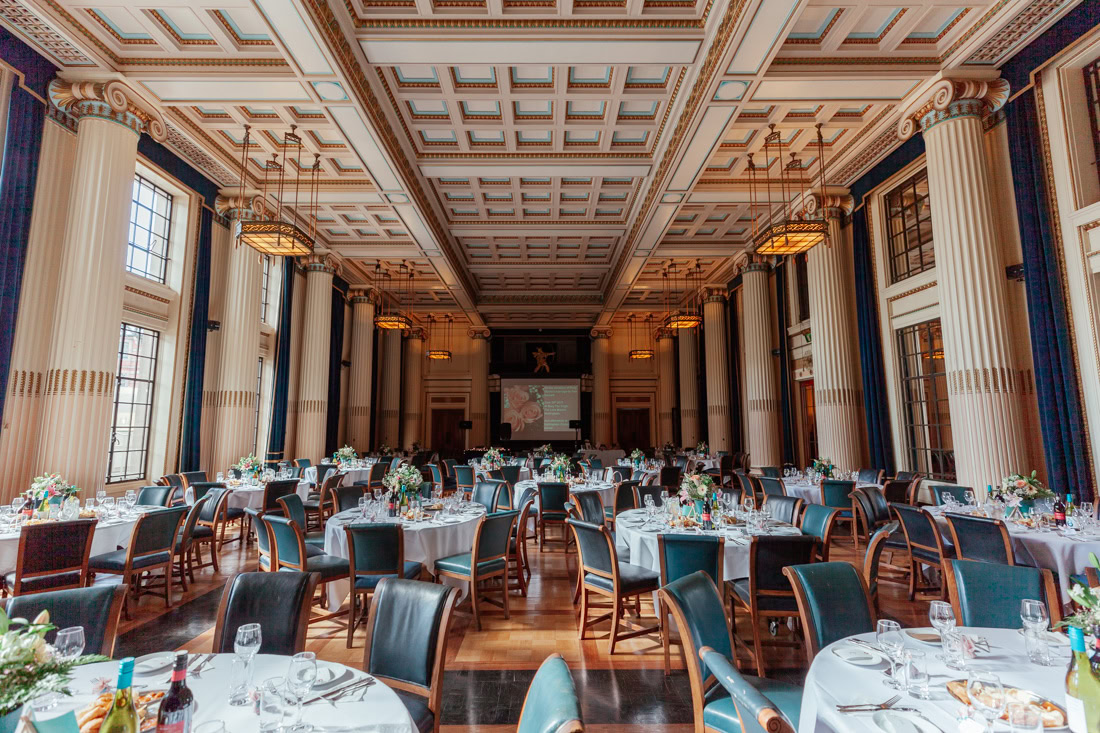The ballroom in Nottingham council house set up for a wedding, roman pillars and big windows
