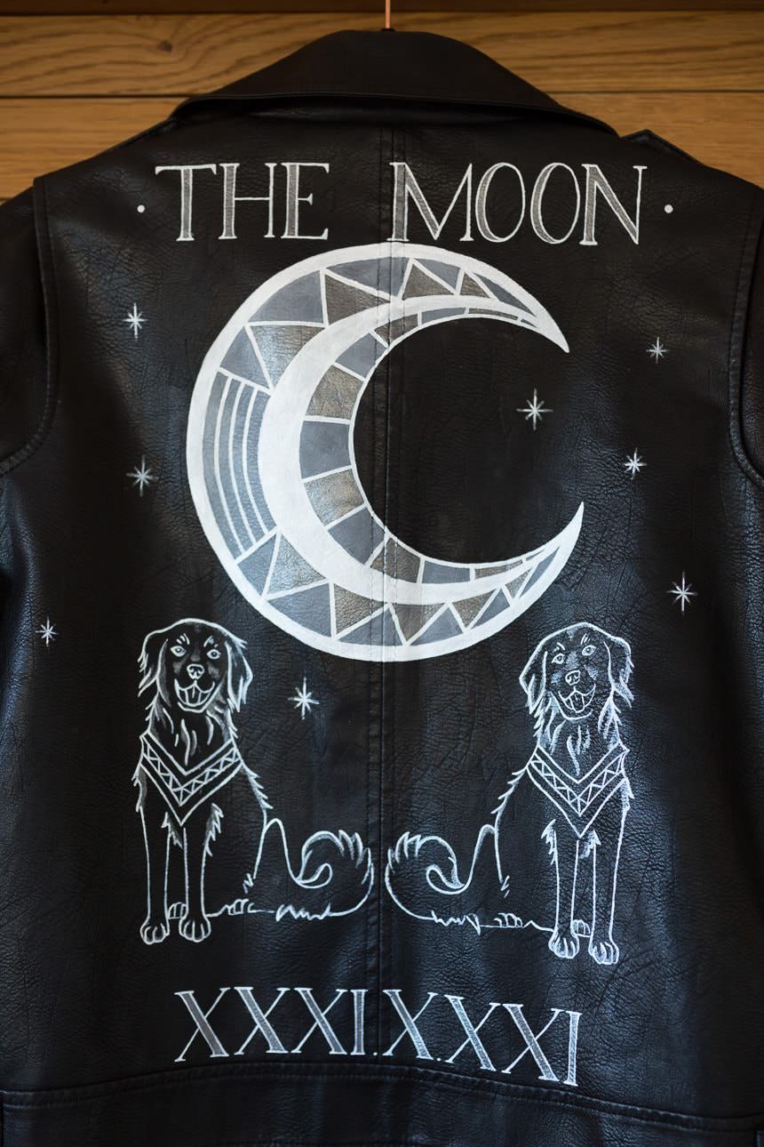 beautiful custom made black leather jacket with date of wedding and drawing on the back panel