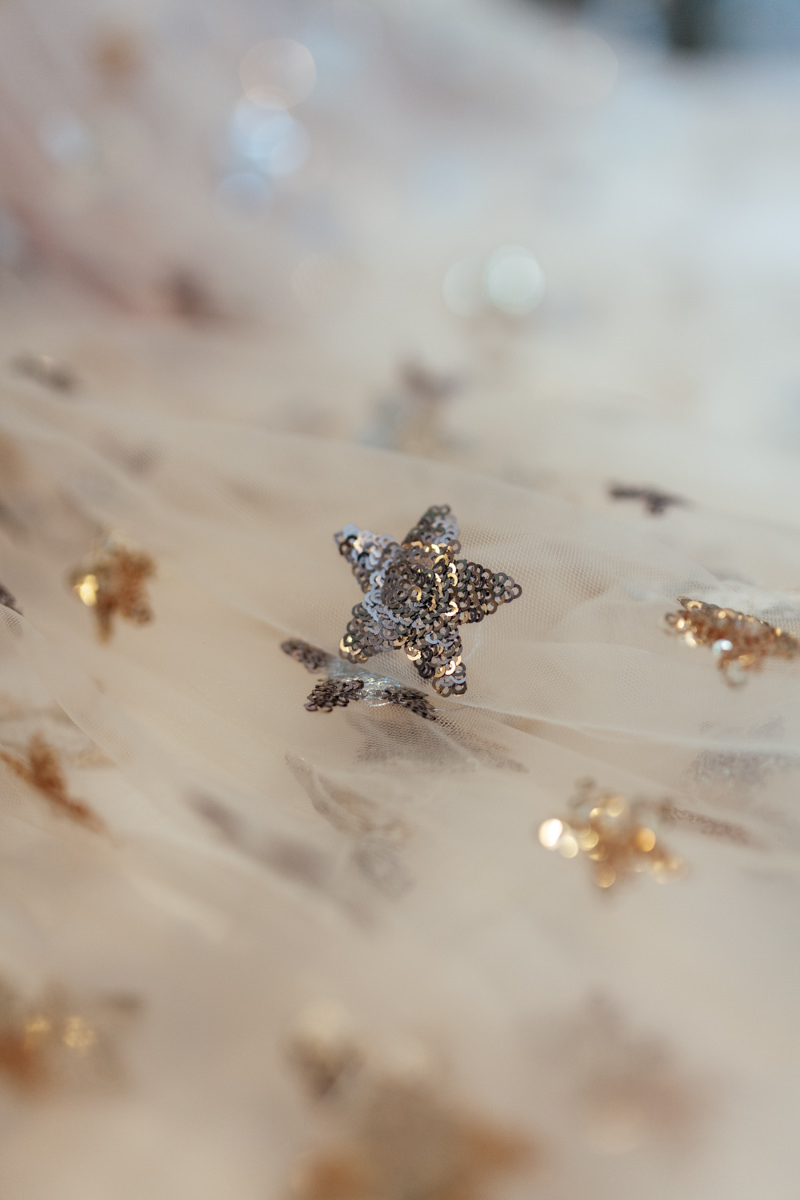 delicate hand sewn sequin star detail